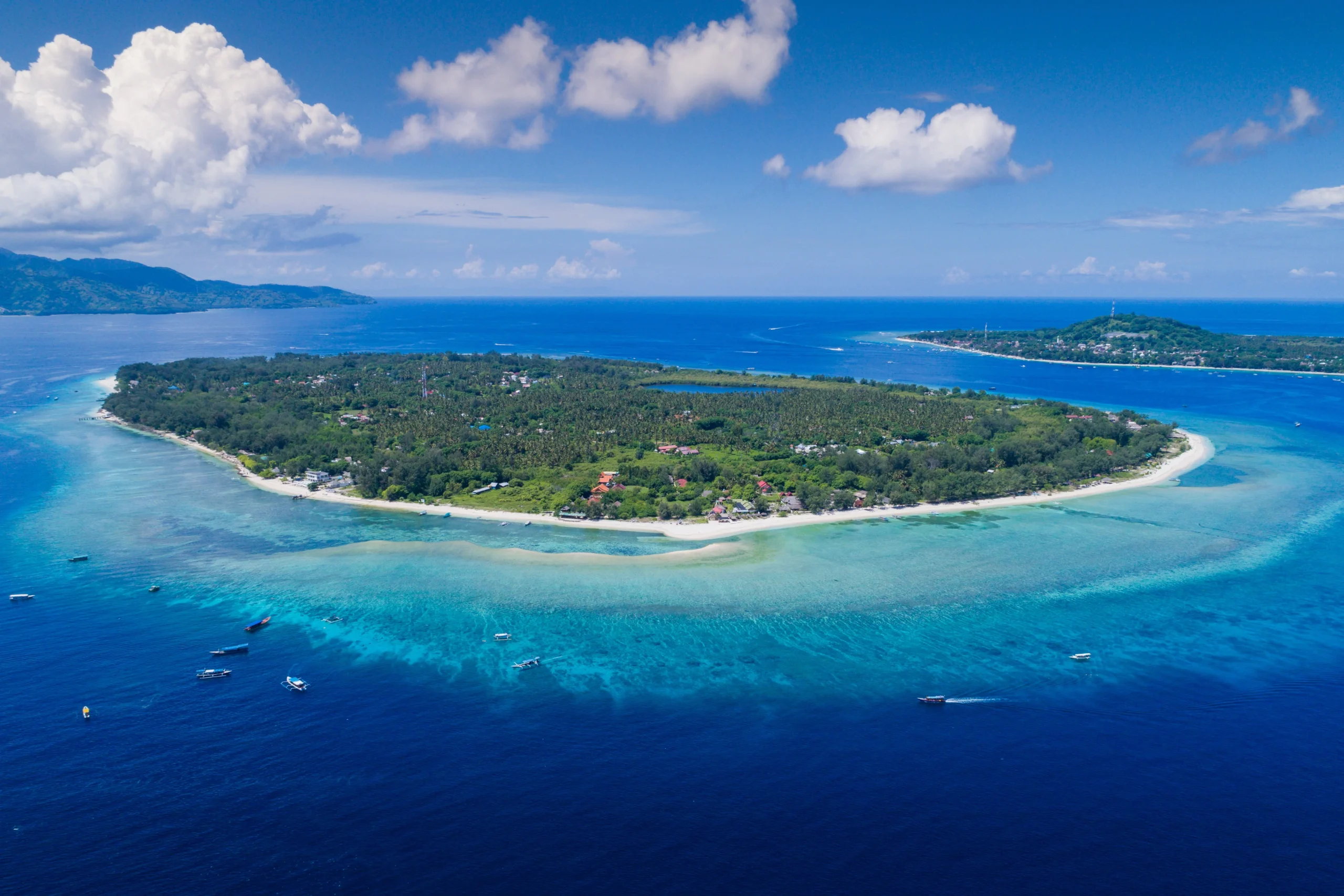 Aerial view of Gili Trawangan with turquoise waters and white sandy beaches